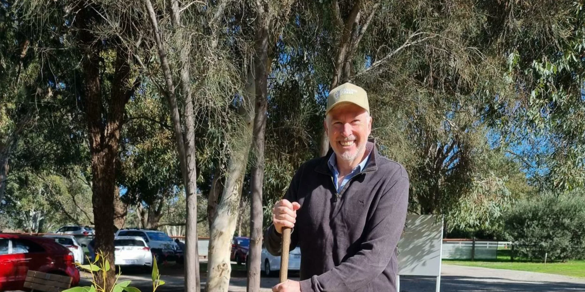 Mark Hullett planting a tree